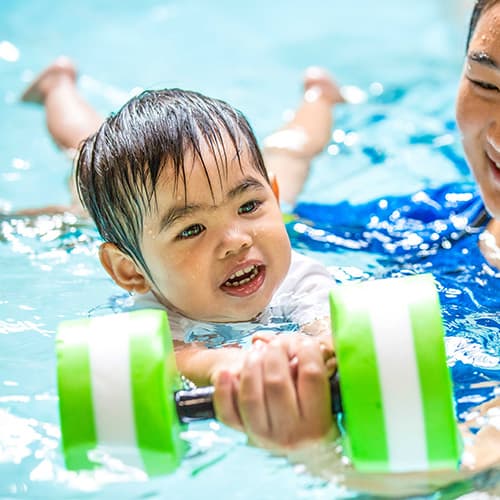 Girl swimming and splashing