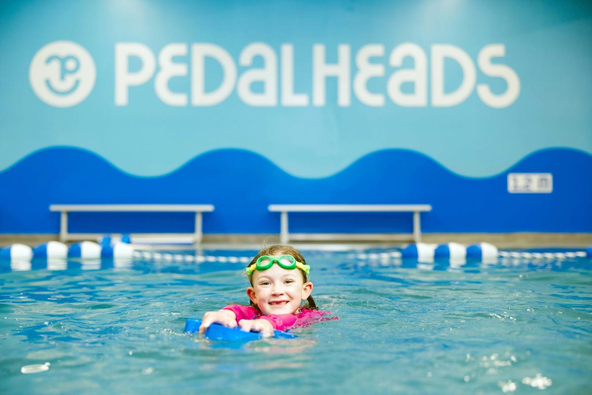 Kid swimming in Pedalheads pool