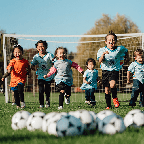 2025 pedalheads soccer kids running at balls