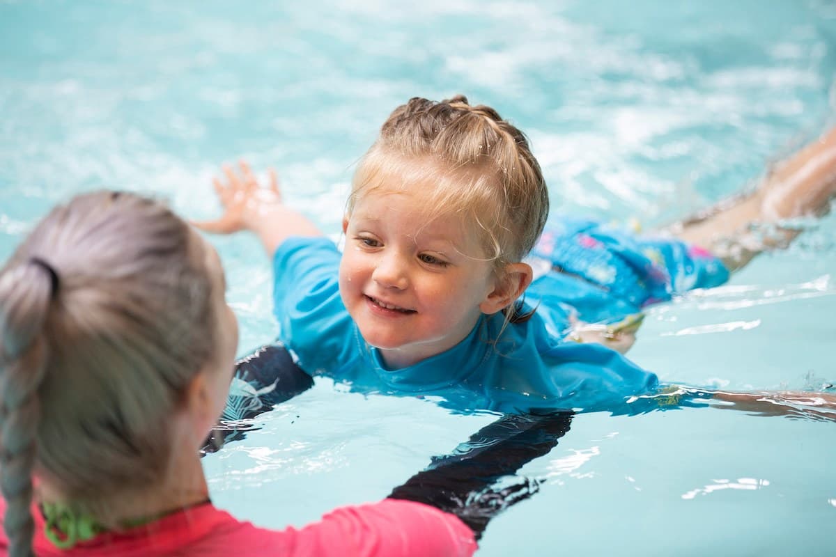 swim lessons help kiddos focus and follow directions