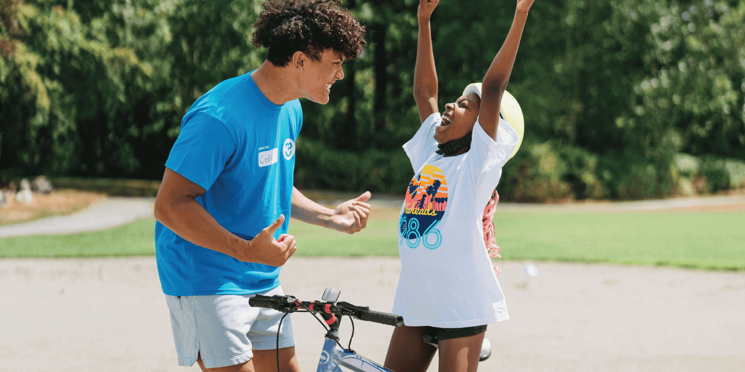 pedalheads+ instructor and camper having fun at camp