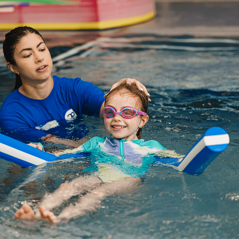 Young girl learning to swim in vancouver
