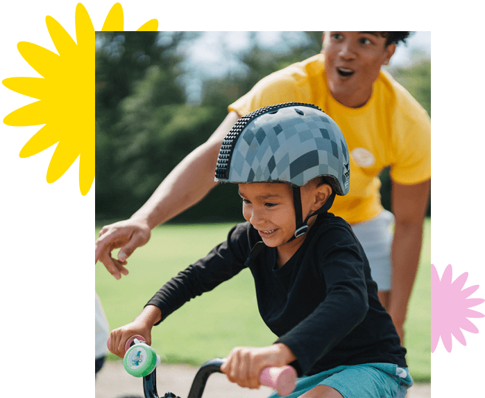 boy riding bike at bike camp